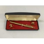 A vintage twenty two carat gold plated pen and pair of cufflinks in original case.