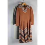 A stylish Horrockses winter dress in caramel, designed with chevrons in grey and beige; a grey