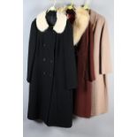 Three wool coats, two trimmed with mink, one with sheepskin