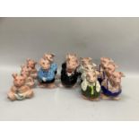 Two sets of five Nat West piggybanks and three further daughter, son and baby piggybanks (13)