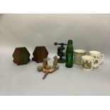 An early 20th century green glass pop bottle together with a wooden bear ball toy and drum, a