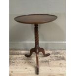 A reproduction mahogany tripod table with wrythen pedestal and on tripod base, 46cm wide