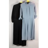 A 1940’s powder blue crepe dress with elegant front beading, cuffed sleeves, small collar to the