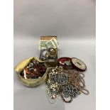 A collection of mid to late 20th century costume jewellery including necklaces, bangles, tie slide