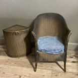 A gilt Lloyd Loom tub chair and matching corner linen basket