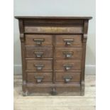 An early 20th century oak Shannon filing cabinet having a bank of eight drawers in two vertical rows