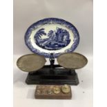 A blue and white meat plate in the style of Spode, a set of weighing scales and a set of weights