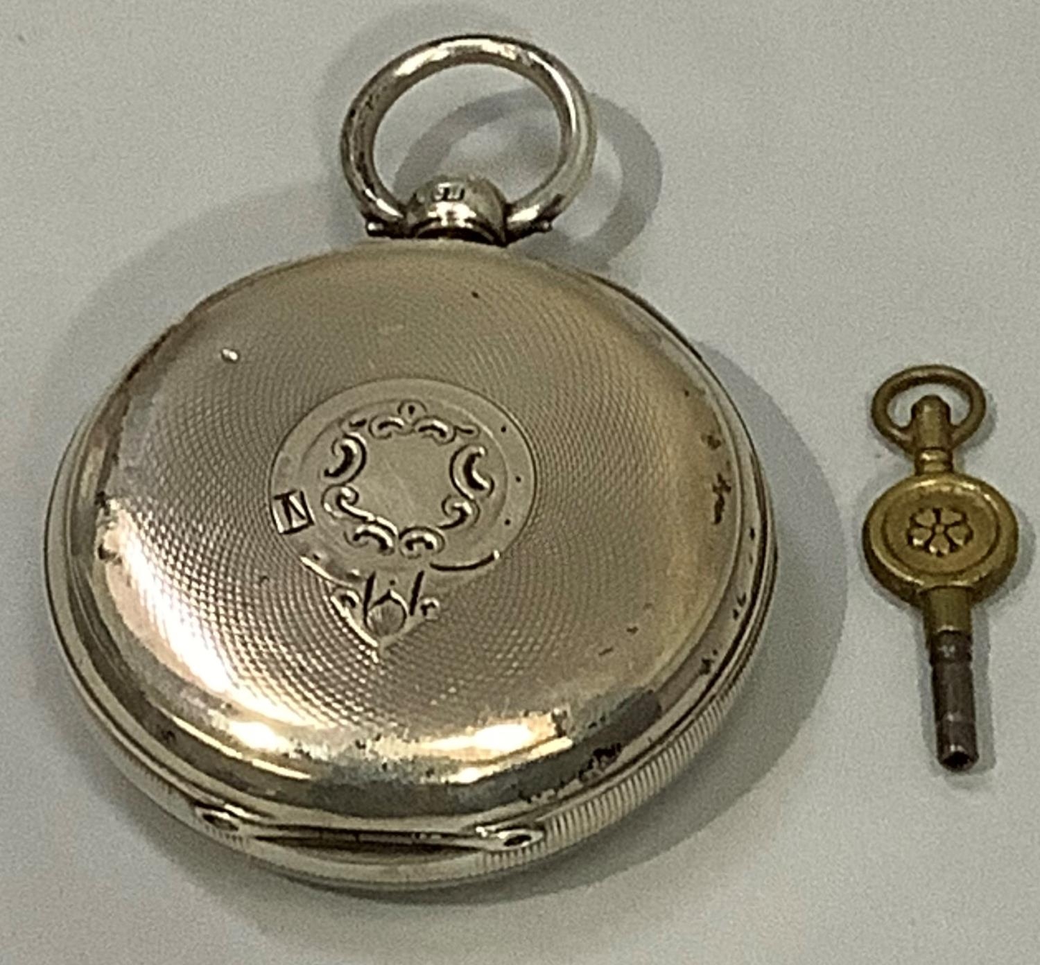 A Victorian 'Ludgate' pocket watch by J . W. Benson London in an open faced silver case, no. U38, - Image 2 of 2