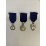 Three silver medallions with ribbons, total approximate weight 47gm