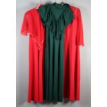 Three vibrant 1970’s full-length dresses with draped sleeves, the first in emerald green,
