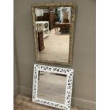 Two wall mirrors in gilt frame and white pierced frame, 84cm x 59cm and 66cm x 66cm