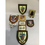 Harrogate memorabilia including various Harrogate coat of arms shields, an engraving of Harrogate, a