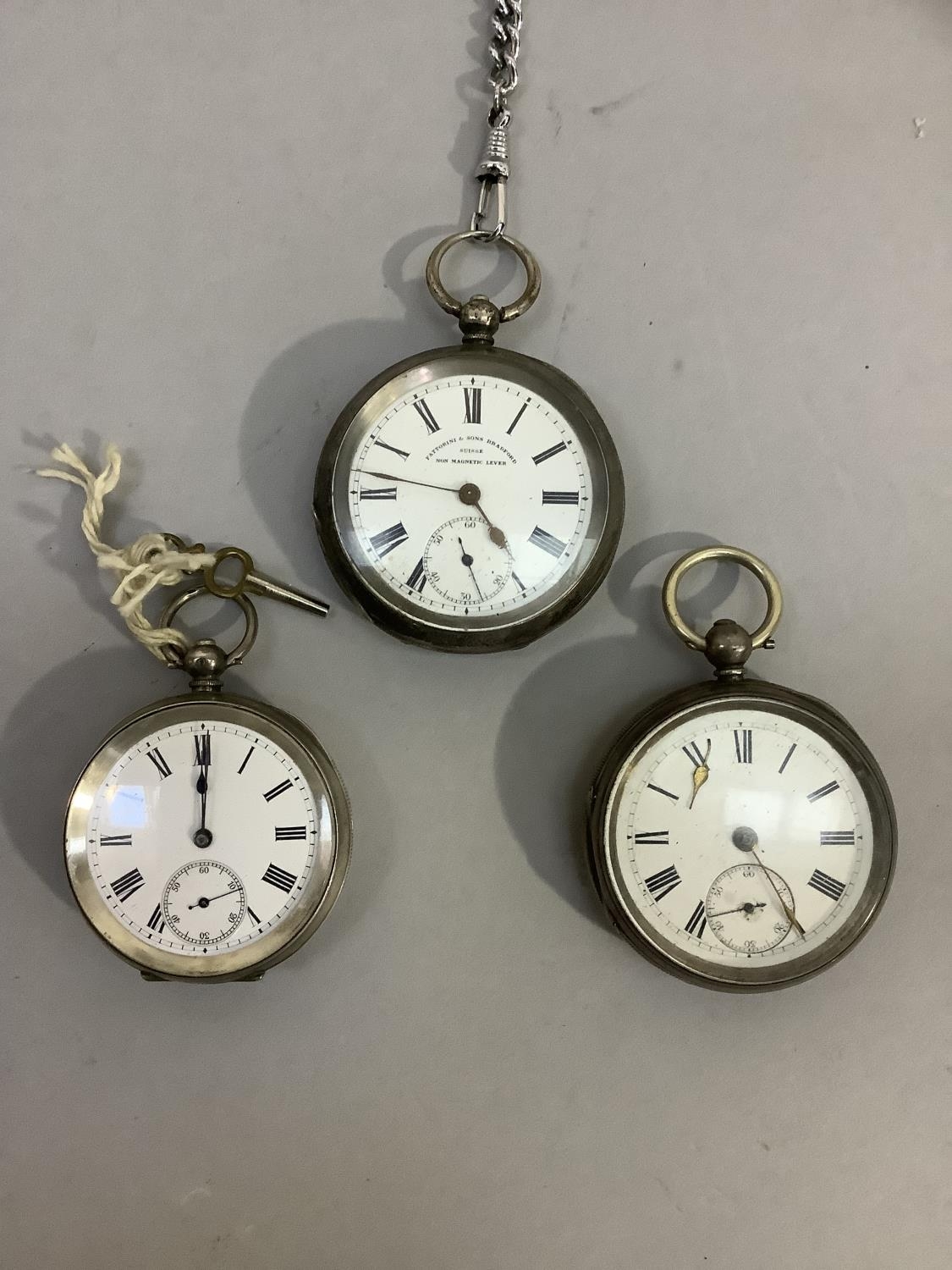 Three 19th century pocket watches all in open faced silver cases and with key wound movements