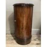 A reproduction mahogany cylinder pot cupboard