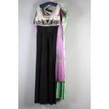 A mauve silk satin short-sleeved dress embroidered in silver with diamanté detail; A full-length