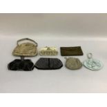 Evening bags, 1920’s to 1950’s, comprising four beaded examples, one with diamanté, one with