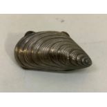 A mussel shell in continental .800 silver c1950, approximate length 53mm, approximate weight 13g