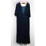 An Edwardian teal velvet dress, the bodice lined in glazed cotton, substantial weight for a mature