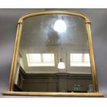 A modern gilt framed overmantel of arched outline, approx 122cm wide x 120cm high