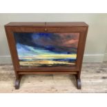 A mahogany portfolio cabinet, double sided, drop fronts, one side painted with a landscape at dusk
