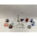 A collection of glass paperweights, Angel fish, animal etched plaques, vase etc