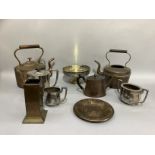 A quantity of copper ware including copper kettles, teapot, plaque, poker stand, three piece