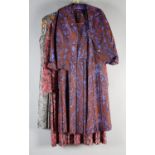 A vintage silk dress with pleated skirt, shades of brown and blue in a floral design, matching