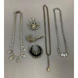 A small collection of costume jewellery c.1950, all foil backed paste including festoon necklaces