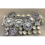 Hutschenreuther blue and white onion pattern breakfast and dinner service comprising fifteen cups,