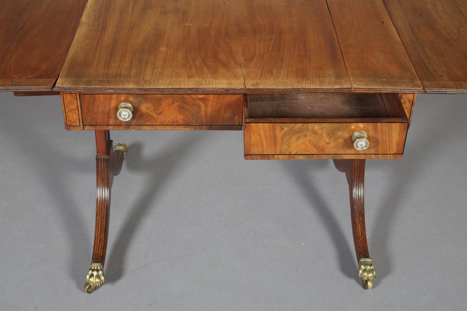 A Regency Mohogany and Rosewood crossbanded sofa table with ebony stringing, having a drawer and - Image 4 of 8