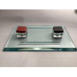 A glass desk standish, rectangular with two glass and leather covered ink wells for red and black