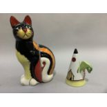 A pair of Lorna Bailey 'cat' bookends 25cm high together with a conical sugar sifter with palm