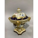 An early 19th century Derby porcelain pot pourri vase and cover, polychrome painted with sprays of