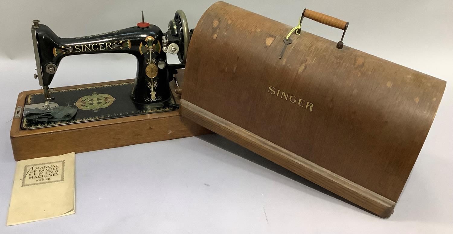 A Singer hand sewing machine