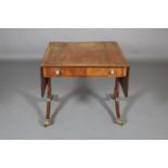 A Regency Mohogany and Rosewood crossbanded sofa table with ebony stringing, having a drawer and