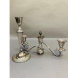 A plated on copper three light candelabrum with baluster column and reeded scroll twin arms,