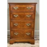 A walnut finished hi-fi cabinet having a lift up top and dummy drawer front, 56cm wide by 88cm high