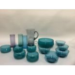 1970's turquoise glass including ten fruit dishes in two styles, serving bowl, together with an