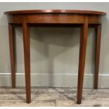 A figured mahogany demi-lune side table on square tapered legs, 93cm wide
