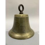 A brass bell with iron pendant ring, 20cm high.