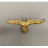 A German WWII Kriegsmarine summer gilt metal breast badge, 9.5cm, (the metal breast eagles were