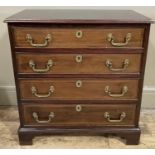 A mahogany dwarf chest of drawers inlaid with chequered stringing, four graduated drawers with brass