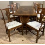 A good oak dining room suite of early 19th century design comprising a set of six chairs with
