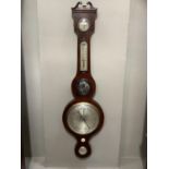 An early 19th century banjo barometer- thermometer with broken arch pediment over dry/damp,