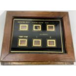 A vintage household bell panel, the black glass with gilt room titles and six windows