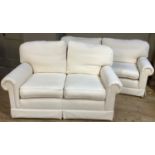 A pair Wesley and Barrel cream upholstered two seater sofas, approximately 190cm by 150cm