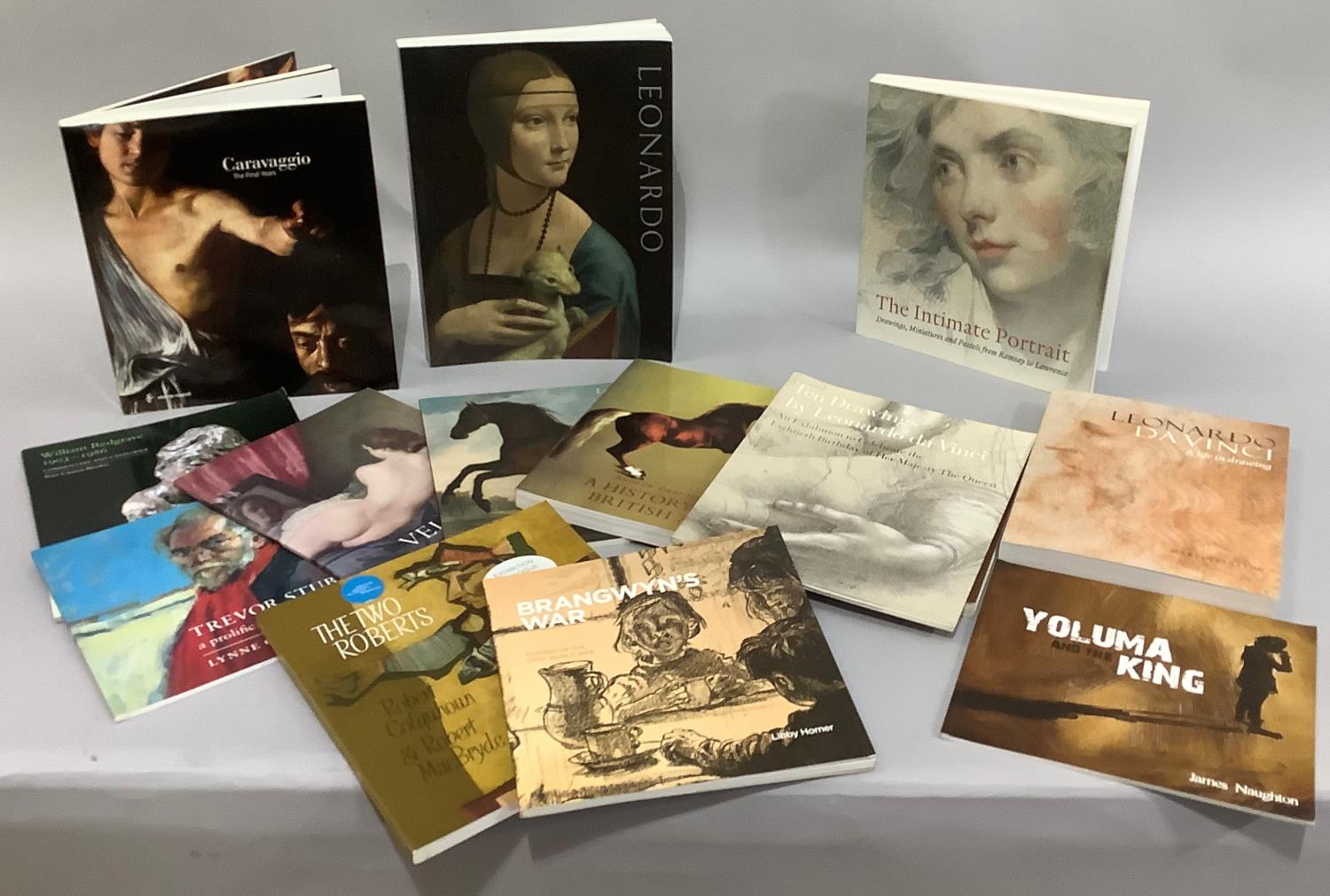 Art books including Leonardo Da Vinci, Caravaggio, portrait drawing from Ramsay to Lawrence and