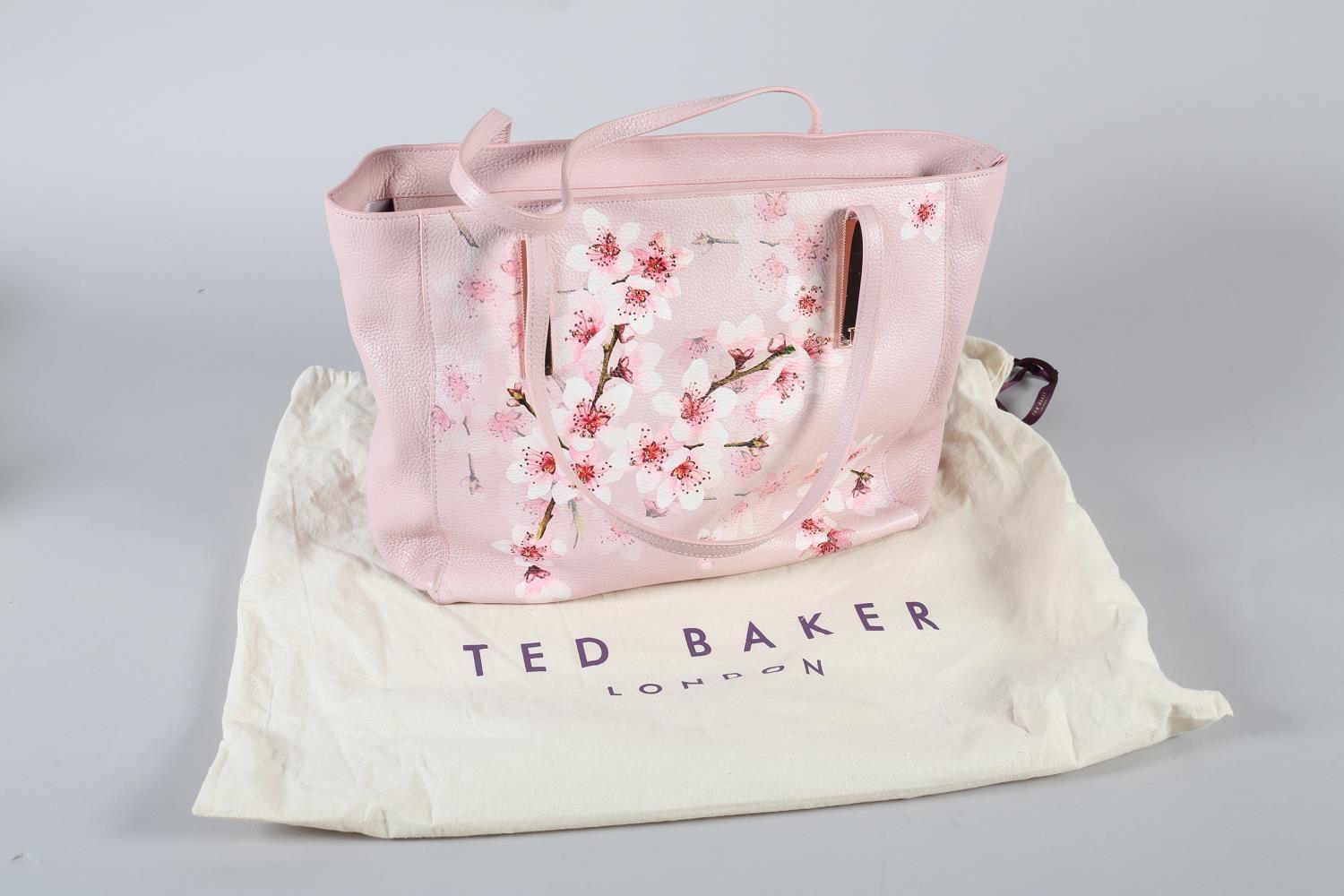 A Ted Baker tote bag in cherry blossom and pink grained leather, with original dustbag, condition: