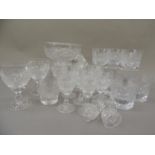 A part suite of heavily cut glass tableware comprising six whisky glasses, two wine goblets, one