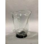 An Orrefors clear and black glass vase of wrythern moulded form, engraved to underside 'Orrefors